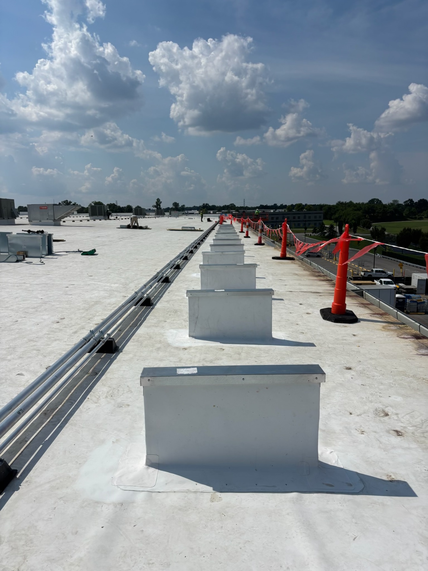 Commercial TPO roofing installation in progress